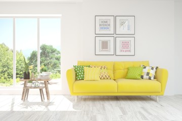 White living room with sofa and summer landscape in window. Scandinavian interior design. 3D illustration