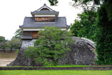 Fototapeta na wymiar A beautiful and old small castle near With the Kumamoto Castle