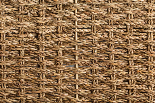 Braided esparto grass ropes forming a flat surface for different uses. Esparto grass ropes are used for traditional Mediterranean crafts.