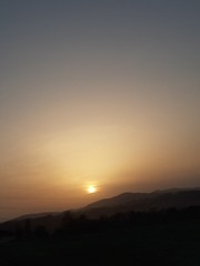 Obraz premium sunset over the mountains