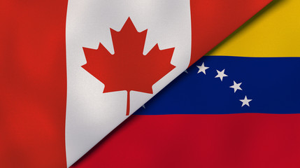The flags of Canada and Venezuela. News, reportage, business background. 3d illustration