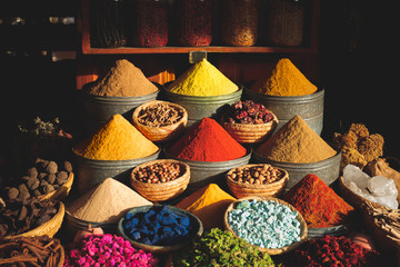 Colorful spices at a traditional market in Marrakech, Morocco
