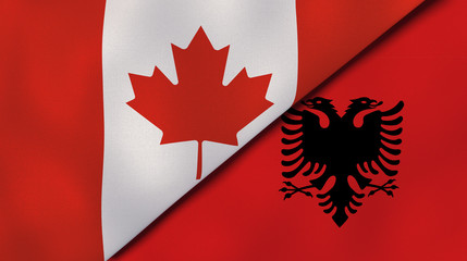 The flags of Canada and Albania. News, reportage, business background. 3d illustration