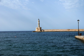 old lighthouse at the entrance to the city bay