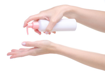 Bottle dispenser cream for hands in hand on white background isolation