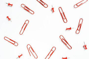 Set of red paper clips business creativity concept. Flat design lay