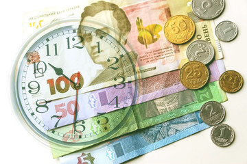 Ukrainian money, coins and time.