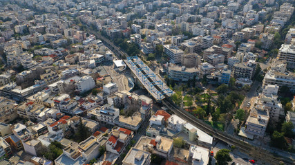 Obraz premium Aerial drone photo of main train station of Marousi centre and district, North Athens, Attica, Greece