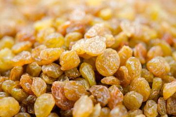 Raisins close up. Dry grapes. Dried fruits for healthy food, dessert substitute