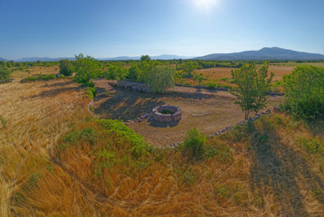 Aerial stiched panorama of the Celtic well in Dalmatian hinterland in Promina municipality in...