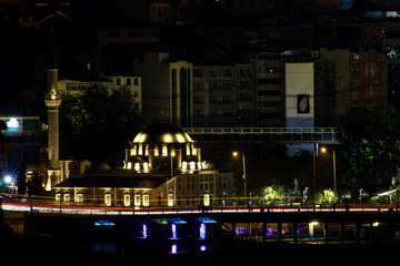 Mosque at night. Bridge lights. 
