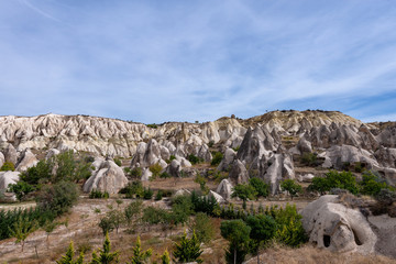Fototapeta na wymiar Goreme national park. Rock formations in famous Sword Valley, Cappadocia, Nevsehir, Turkey