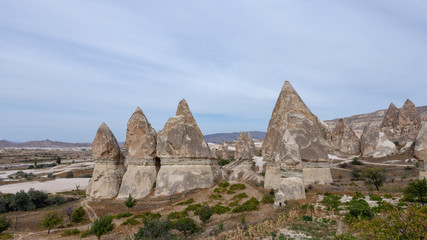 Goreme national park. Rock formations in famous Sword Valley, Cappadocia, Nevsehir, Turkey