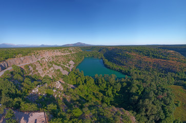 Aerial stiched panorama of the Brljan lake located downstream of Bilusic buk on the exit from canyon of Krka River in Dalmatian Zagora.