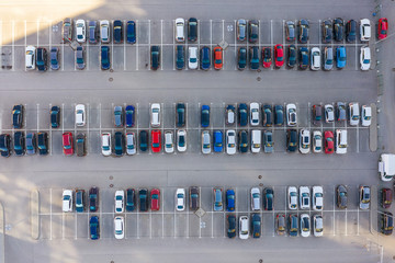 Open air big parking for residents of the area, top aerial view from high