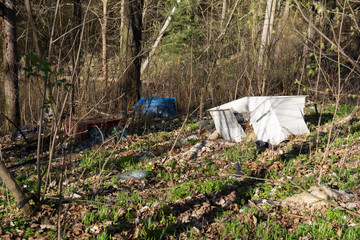 Trash in the woods Poland - throwing garbage into the forest