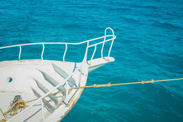 A Ship yacht in travel vacation by the sea background. The nose of the boat.