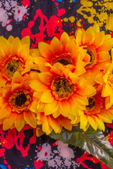 Background of plasticized multicolored flowers