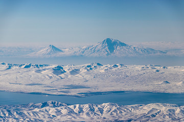 Winter landscape with Ararat mountains and Sevan lake