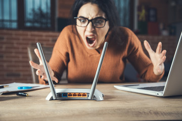 angry woman with Wifi router
