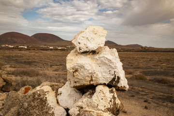 Fototapeta na wymiar white stone compilation in desert