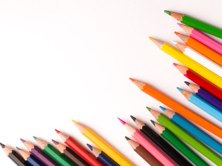 Fototapeta premium colourful pencils isolated templates to be used as background. 