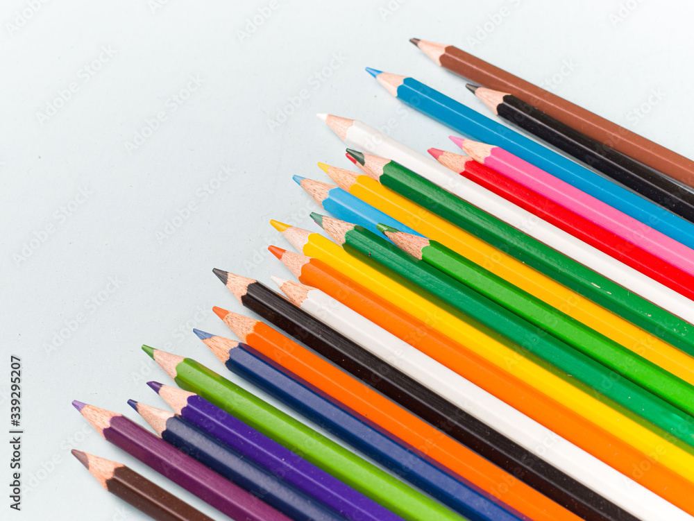 Wall mural colourful pencils isolated templates to be used as background.