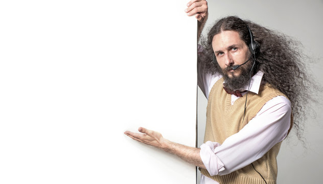 Eccentric man pointng on the empty board