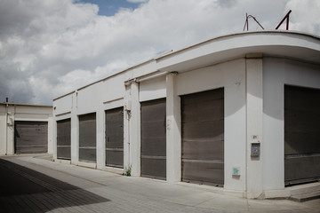 Market building with shutters closed