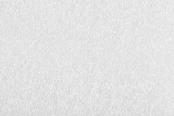 White plastic package background texture close up. Top view.