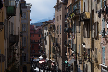 Fototapeta premium Nice, France - April 2017: Colours and styles of Nice classic apartment buidlings