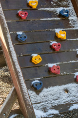 a steep ramp with colorful rock climbing steps