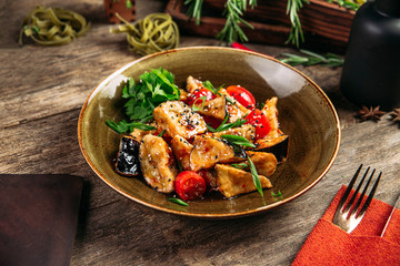 Dried eggplant in batter on the wooden table, asian cuisine, horizontal