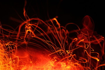 Sparks of fire from burning coconut husks