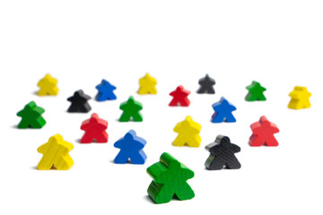 Networking of people. Leadership in a group of people. Colorful game figures.
