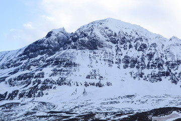 Obraz premium Beautiful snow capped mountains against the sky in Iceland