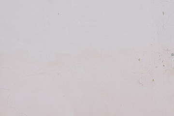 Pink cement wall dirty background for texture abstract