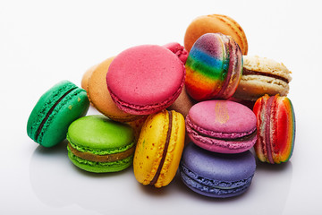 Fototapeta na wymiar Multi-colored Macaron folded in a stack on a white background