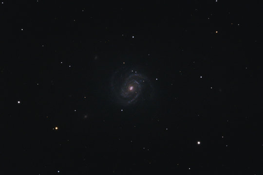 The intermediate spiral galaxy Messier 100 in the constellation Coma Berenices photographed with a Maksutov telescope from Mannheim in Germany.