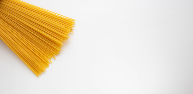 Spaghetti, yellow paste isolated on a white background
