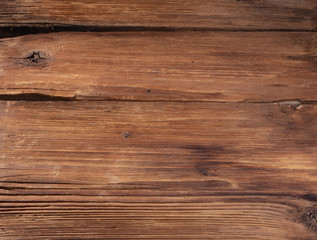 Fototapeta premium Brown oak wooden texture background, close up. Macro texture of oak layers
