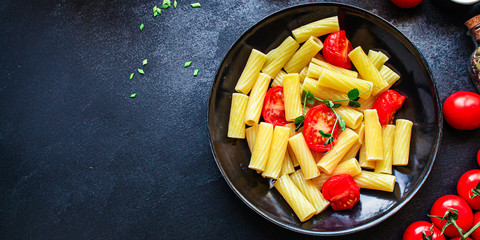 pasta with tomatoes ready to eat healthy food
Tortiglioni and tomato sauce (Italian main course Maccheroni, Rigatoni) menu concept. food background. top view. copy space for text