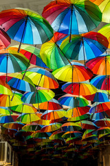 Fototapeta na wymiar Decorative umbrellas in the streets of Bucharest, Romania