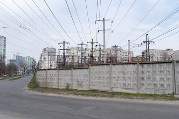 Power line in a residential area of the city. Energy production.