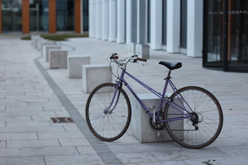 Fototapeta na wymiar bicycle on the street and revolving doors 