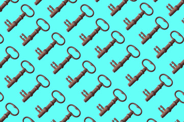  pattern of old rusty keys on a blue background. the key is repeated many times