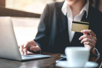 Businessman working on financial business via laptops and credit cards