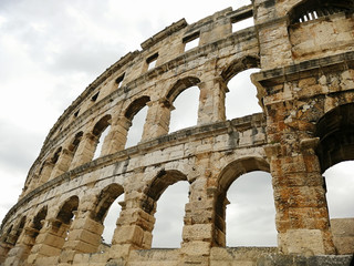 Obraz premium The Roman Colosseum (Coloseum) in Rome, Italy wide panoramic view. tourist destination