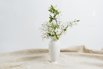 beautiful spring bouquet with white tender flowers