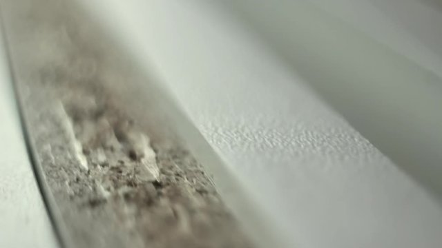 travel slider camera on the edge of the chipboard, close-up